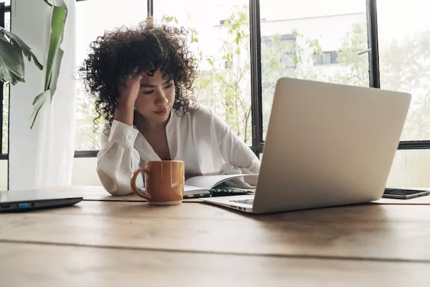 Iron deficient vegetarian woman feeling fatigue at work